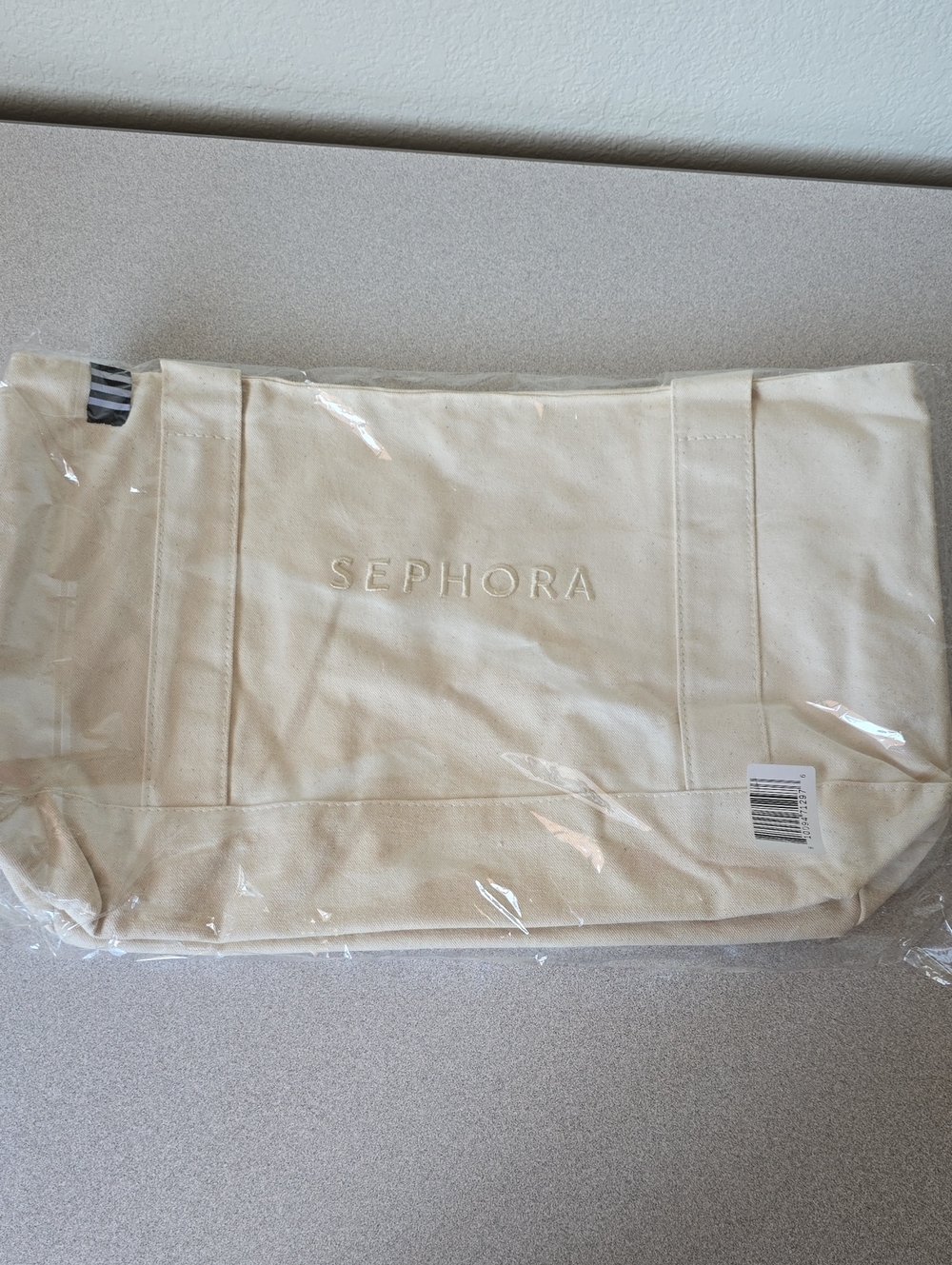 Sephora Cream Embossed Canvas Tote